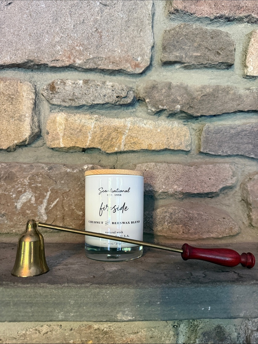 Vintage brass candle snuffer with wooden handle